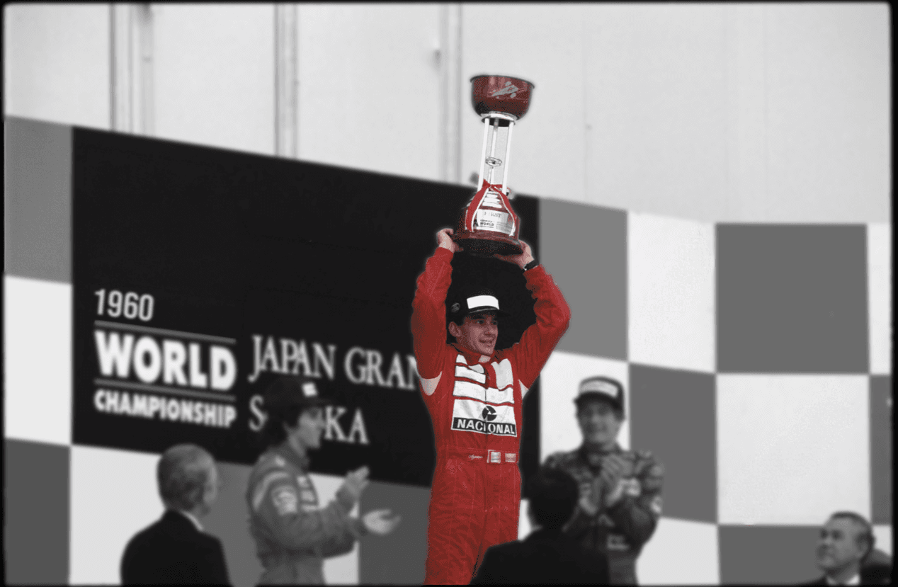 Ayrton Senna celebrates on the podium